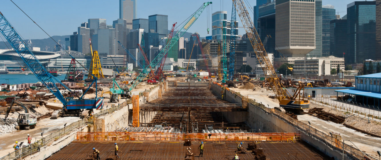Baustelle in Hongkong - symbolisch für Bevölkerungs- und Wirtschaftswachstum
